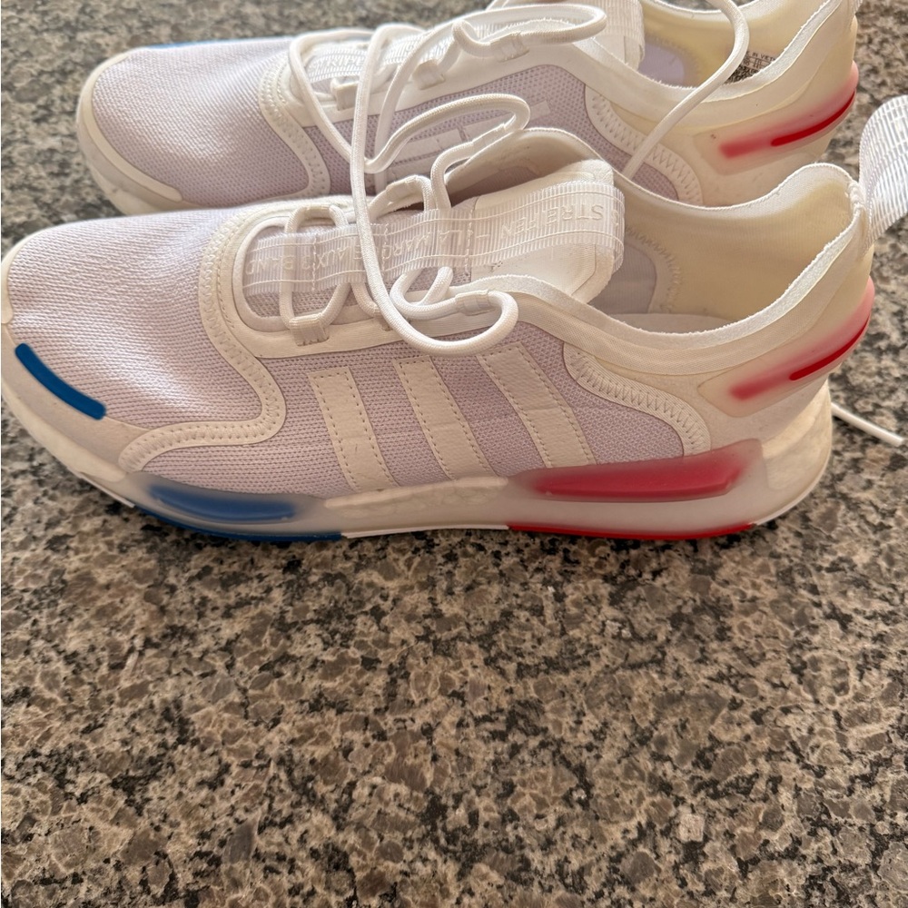 Adidas NMD_V3 sneakers in the "Cloud White/Blue/Red" color